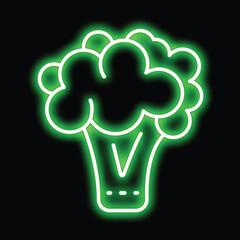 Green neon sign illuminating a broccoli with its florets and stalk on a black background