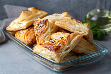 Triangular puff pastry with cheese is delicious