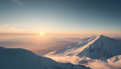 Sunrise Over a Snowy Mountain Range with Fog