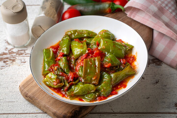 Fried green peppers with tomato sauce - Turkish name; domates soslu kizarmiş biber