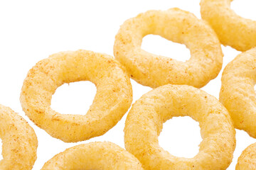 Crispy ring snacks isolated on white background. Corn onion rings in bowl isolated on white background. Crispy onion rings, isolated on white background. Snacks for watching movies.