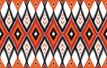 Vibrant pattern ikat ethnic seamless background. Geometric aztec design. Trendy bohemian style. Abstract diamond in orange, black, white colors. Modern textile pattern for fashion and home decor.
