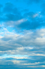 Blue cloudy sky background, vast blue sky with dramatic colorful clouds, blue sky with clouds in the evening time