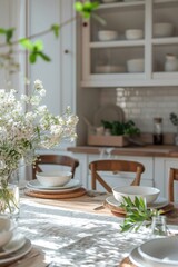 A table with a vase of flowers and a white tablecloth. The table is set with plates, bowls, and silverware. Scene is warm and inviting
