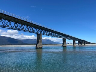 Scenic spot at Haast River Bridge, one lane bridge in Haast, West coast, South Island, New Zealand. Bridge over the river