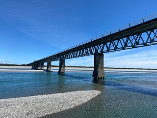 Scenic spot at Haast River Bridge, one lane bridge in Haast, West coast, South Island, New Zealand. Bridge over the river