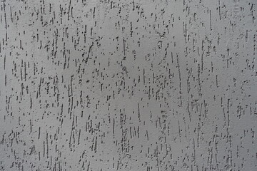 ash gray wall with stucco worm finish texture