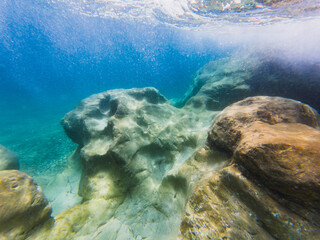 Underwater photo. Mediterranean Sea off the coast of Nice in southern France, seabed and rocky shore.