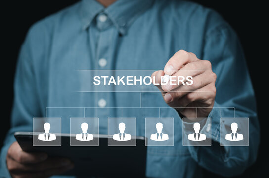 Stakeholders concept. Person touching stakeholders icon on virtual screen for business finance stakeholder investment management. Different stakeholders contact collaboration for company organization.