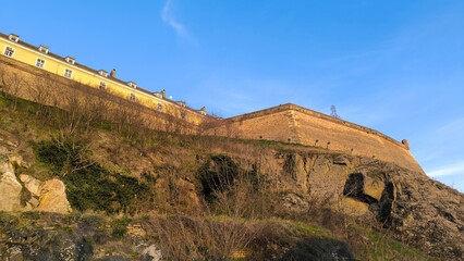 Fototapeta premium walls of Petrovaradin Fortress with blue sky and moon