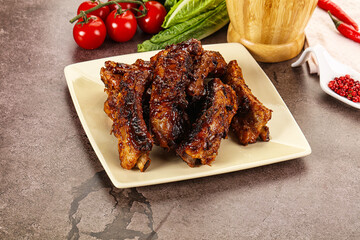 Grilled pork ribs in barbecue sauce