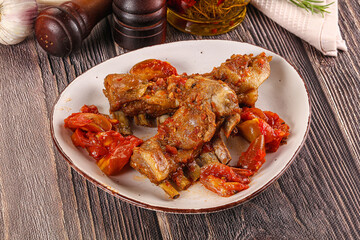 Baked lamb ribs with vegetables