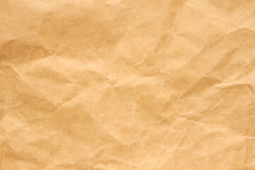 Abstract crumpled and creased recycle brown paper texture background