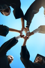 Hands together, support and students in outdoor huddle at graduation with friends or achievement at...