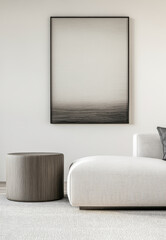 Modern living room with a minimalist design featuring a light gray sofa and a large abstract painting in a serene setting