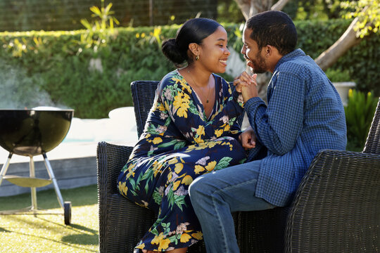 Couple relaxing in garden
