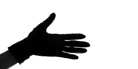 Obraz premium A hand is shown in a black glove, with the thumb pointing to the camera