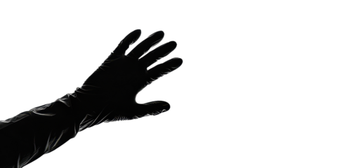 A hand is shown in black and white with a glove on it