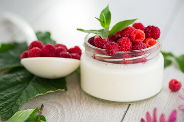 homemade food, milk yogurt with fresh raspberries