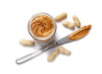 Tasty peanut butter and nuts isolated on white, top view