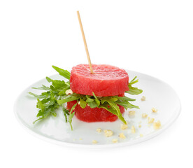 Tasty salad with watermelon, cashews and arugula isolated on white