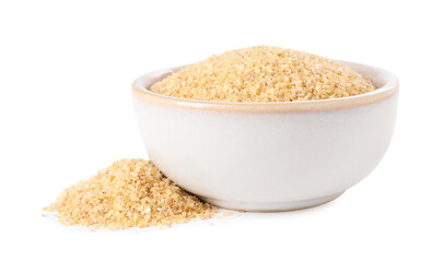 Raw wheat groats in bowl isolated on white