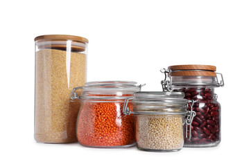Different types of cereals and legumes in containers isolated on white