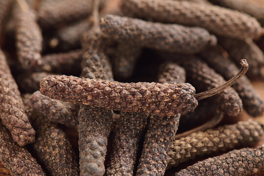 A heap of java long pepper, close-up