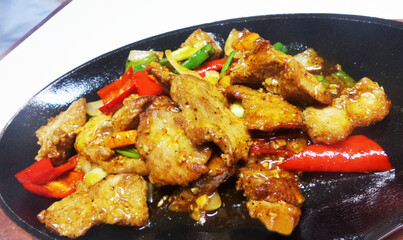 a dish black pepper chicken 