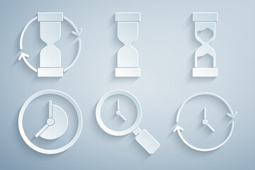 Set Magnifying glass with clock, Old hourglass, Clock, and icon. Vector