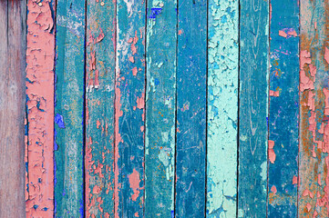 Texture wooden background with old wooden painted multicolor textured surface covered with peeling...