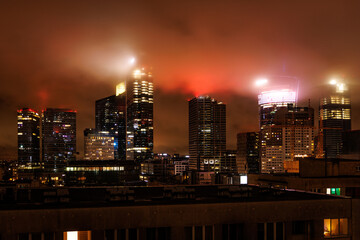 Fototapeta premium Big city business center at night, Warsaw cityscape.