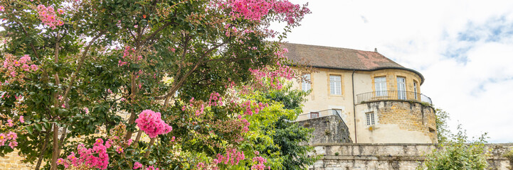 Windows and balcony of a tower of Chateau-Vieux building in Bayonne, France