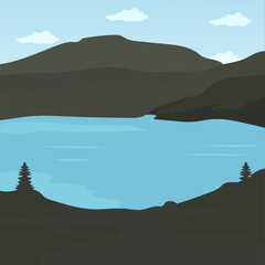 a body of water with mountains in the background