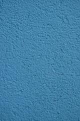 Obraz premium chipped old blue paint on the corner of the house, deterioration, old surface of the house 