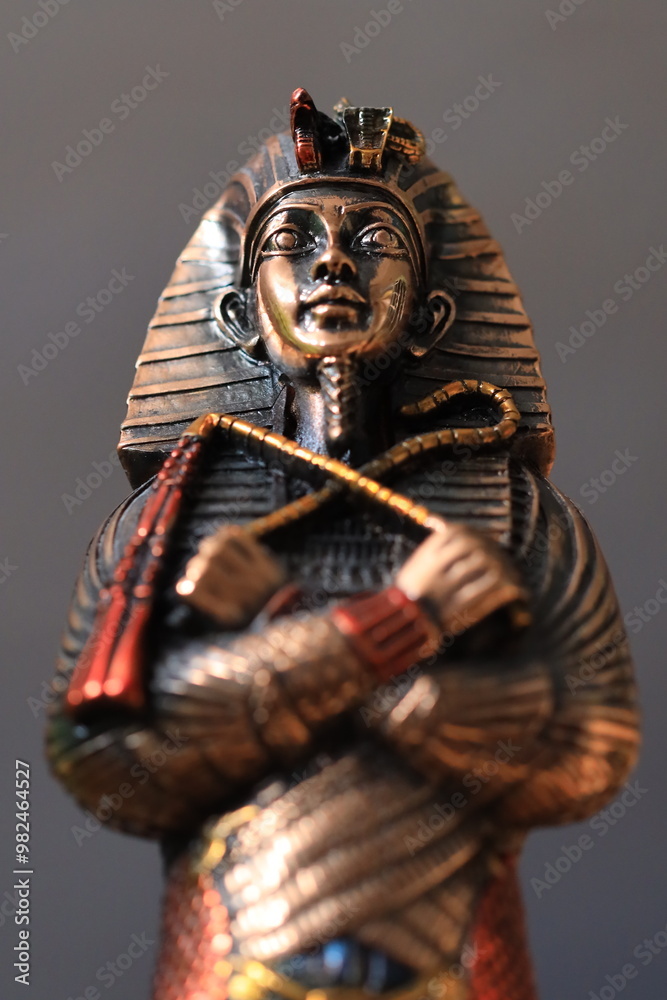 Poster a detailed view of a statue depicting a person riding a horse, perfect for artistic or historical co