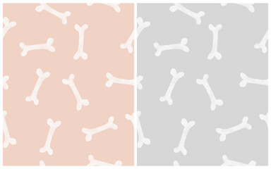 Seamless Vector Pattern With White Hand Drawn Bones On Light Gray And Light Blush Pink Background. Endless Irregular Print with Dogs' Snack. Funny Skeleton Bones Pattern ideal for Halloween. 