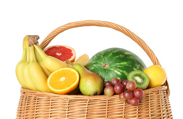 Many different fresh fruits in wicker basket isolated on white