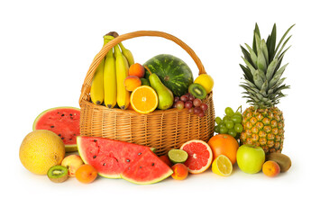 Many different fresh fruits in wicker basket isolated on white