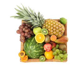 Many different fresh fruits in crate isolated on white, top view