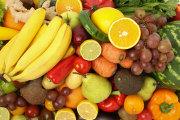 Many different fruits and vegetables as background, top view
