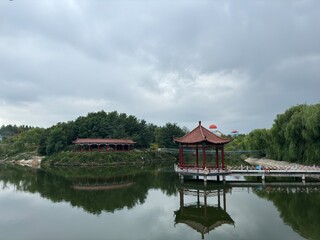 Beautiful scenery of rural areas in northern China, fields and reservoirs, distant mountains with faint shadows