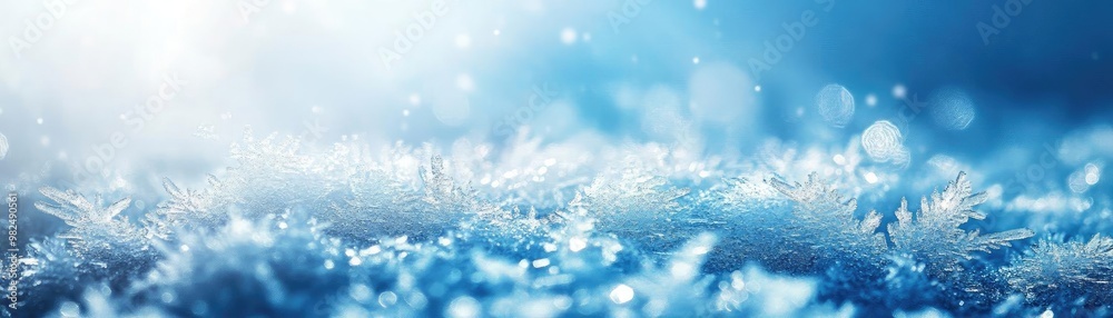 Poster close-up of beautiful frost patterns on a fresh snow surface, sparkling under sunlight, creating a s