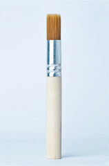 round paint brush with wooden handle