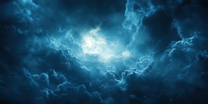 Dramatic clouds illuminated by soft light, creating a mysterious and atmospheric scene. Perfect for backgrounds and mood settings.