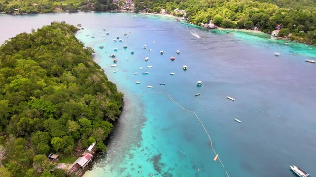 Serene Dock of Motorboats by the Emerald Sea