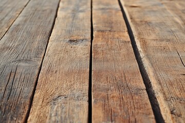 Fototapeta premium A close-up view of old wooden planks showing a rustic and weathered texture, emphasizing the grain and patterns.
