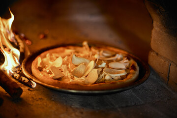 Pizza in a bread wood fired oven