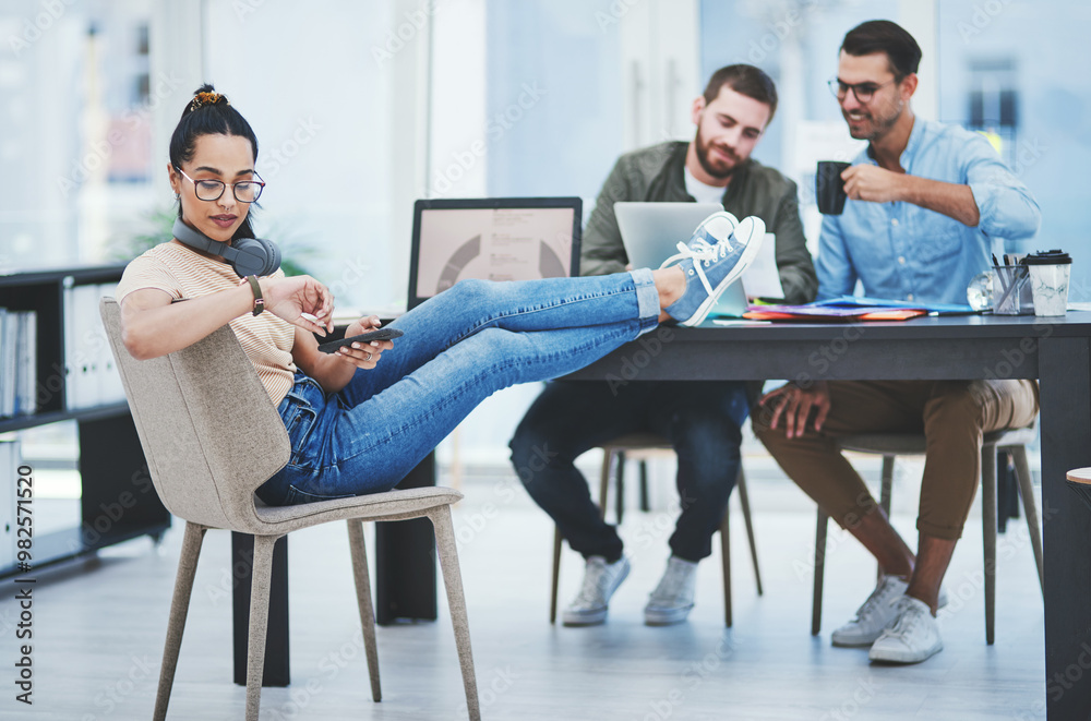 Poster Business woman, watch and meeting time in web design, brainstorming or office strategy. Feet up, creative designer and phone with coworkers for teamwork, collaboration or online startup with laptop