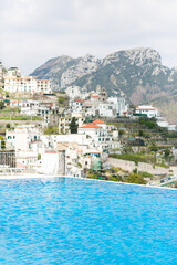 infinity pool on a sunny day overlooking the Amalfi Coast, Italy